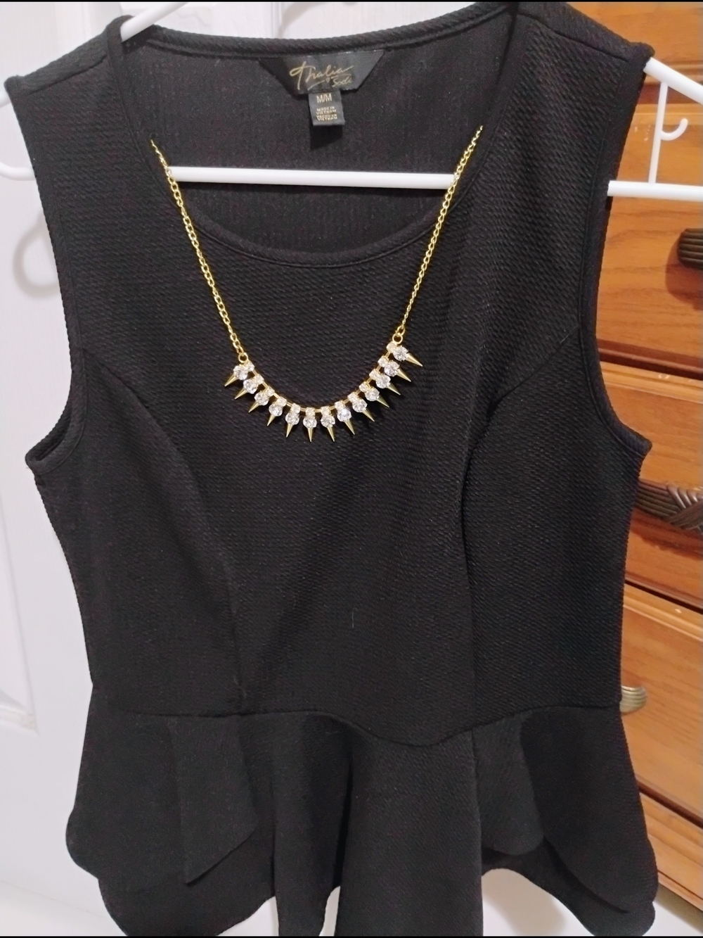 Thalia Sodi Black Peplum Sleeveless Top with Gold Accent Necklace